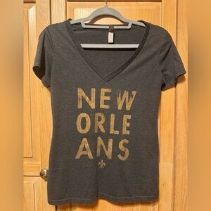 Fleurty Girl Next Level Black and Silver New Orleans V-Neck T-Shirt